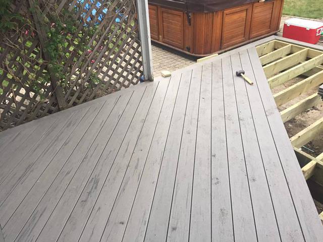 Prestige Woodworks - Christian Neudecker - Deck Contractor - Boarded Fiberon Composite Deck Timbertech Colour Silver Maple in a 45 degree angle - In Construction