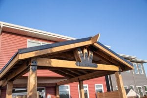 Prestige Woodworks - Christian Neudecker - Deck Builder - Pressure Treated Covered Deck with Gabled Roof with Eavestrough System - Ozco Pergola Hardware - Outdoor Light Fixture with Indoor Light Switch - 3